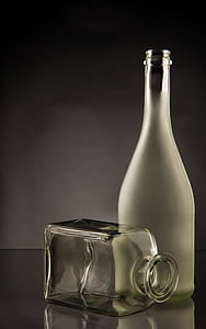 two clear glass bottles thumbnail