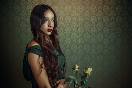 low light photography of woman facing sideways thumbnail