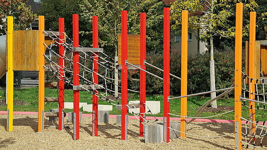 photo of red and brown playground thumbnail