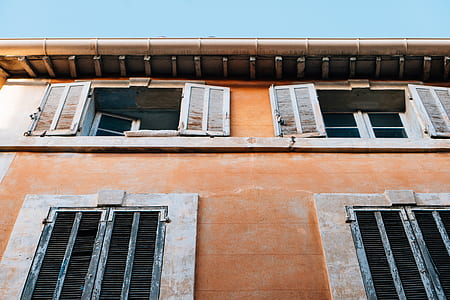 worms eye view of brown concrete building thumbnail