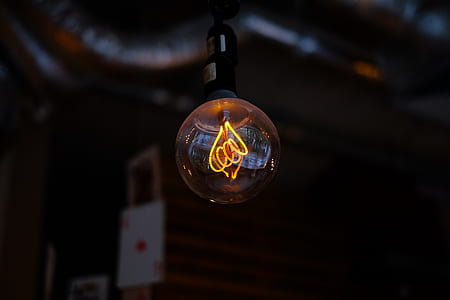 selective focus photography of turned on light bulb thumbnail