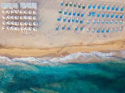 aerial photography of people near beach during daytime thumbnail