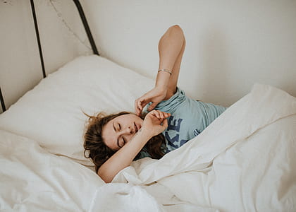 woman lying on bed thumbnail