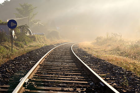 railway between grass background of mountain thumbnail