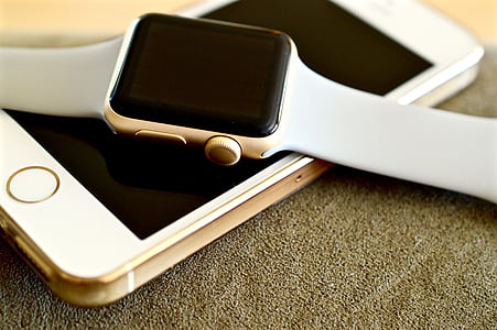 gold aluminum case Apple Watch on gold iPhone thumbnail
