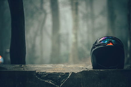 Black Half-faced Helmet on Gray Concrete Wall thumbnail