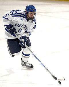 person playing ice hockey wearing ice hockey gears thumbnail