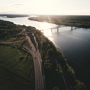 bird's eye view photo of bridge near body of water thumbnail