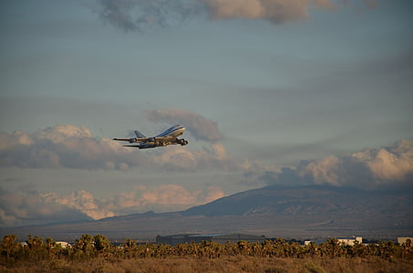 flying airplane during daytime thumbnail