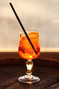 clear wine glass filled with beverage thumbnail