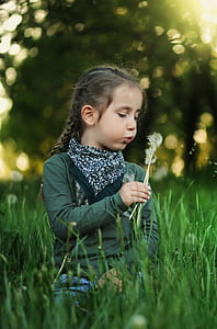 girl wearing green crew-neck long-sleeved shirt thumbnail