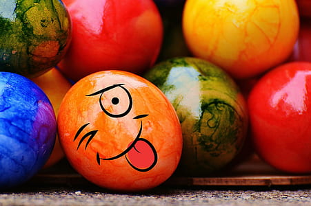 orange emoji painted egg thumbnail