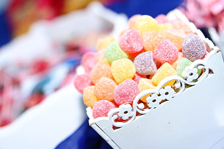 sugar coated assorted-color gummy candies in white steel container thumbnail