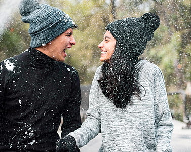 couple laughing on each other under winter season thumbnail