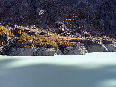 cliff near body of water thumbnail