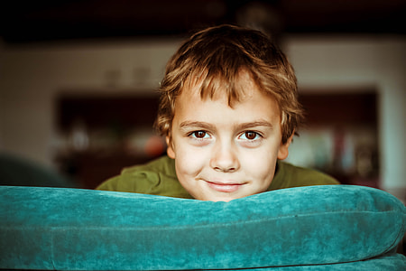 boy on sofa photo thumbnail