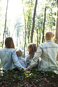 family watching trees during daytime thumbnail