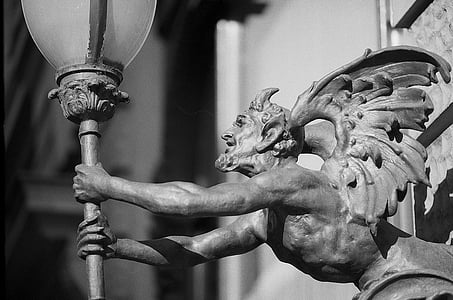 devil holding lamp statue thumbnail