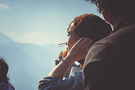 woman standing beside man thumbnail