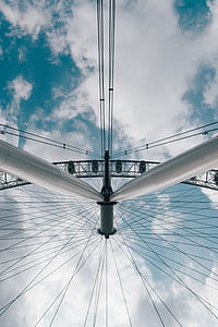 Ferris Wheel under cloudy sky thumbnail