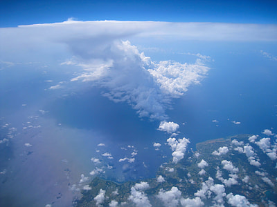 aerial photography of island near body of water thumbnail