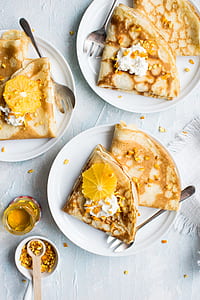 baked roti breads on white ceramic plates thumbnail