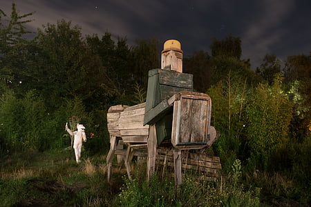gray metal machine near green leafed trees thumbnail