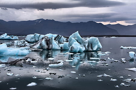 ice berg on body of water thumbnail