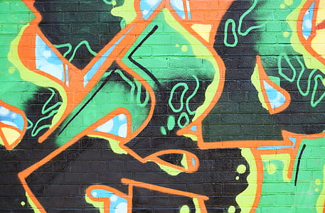 green, orange, and grey graffiti wall thumbnail