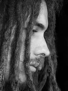 grayscale close-up photography of man thumbnail