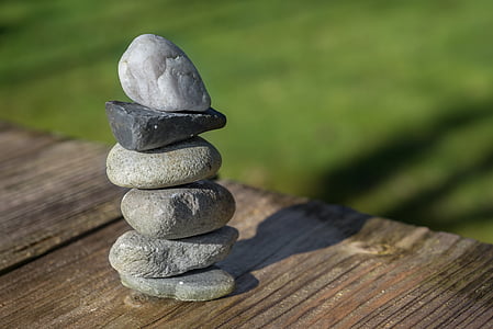 selective focus photography of cairn stone thumbnail