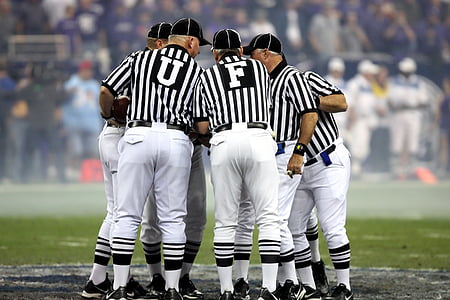referees forming a circle thumbnail
