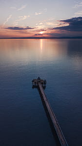 photo of dock and house on body of water thumbnail