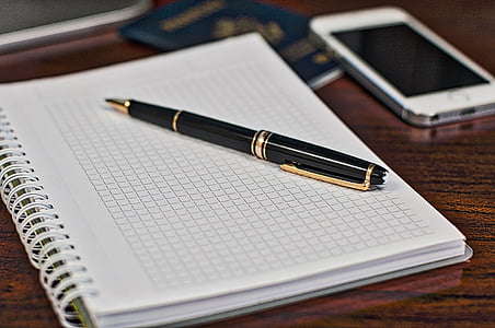 retractable pen on notebook thumbnail