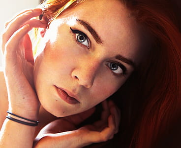 close-up photography of red-haired woman thumbnail