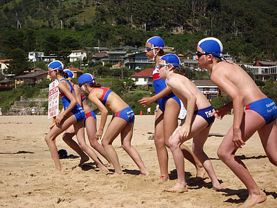 Nippers at start position before their swim at Stanwell Park beach in Wollongong, New South Wales, Australia thumbnail