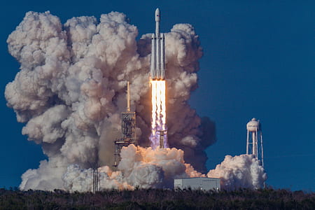 space rocket launching off launch pad thumbnail