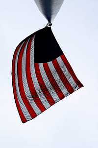 low angle photo of U.S.A flag at daytime thumbnail