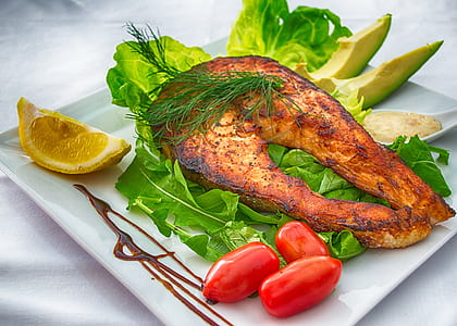 cooked fish on plate with side dish thumbnail