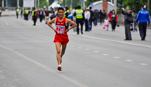 man running on asphalt road thumbnail