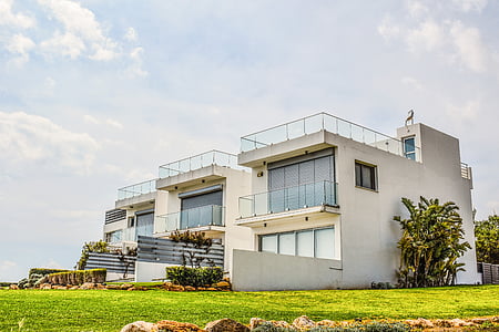 white and gray concrete house thumbnail