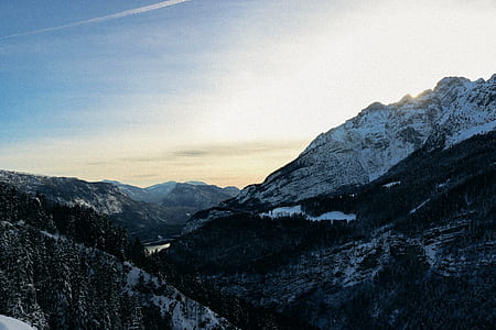 snow-covered mountains during daytime thumbnail
