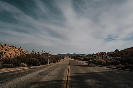 empty road during daytime thumbnail