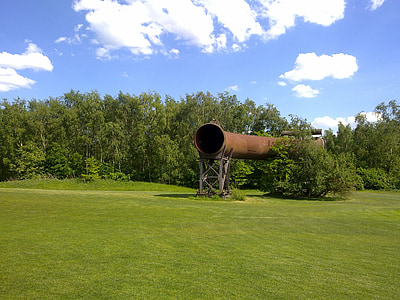 brown metal pipeline on forest during daytime thumbnail