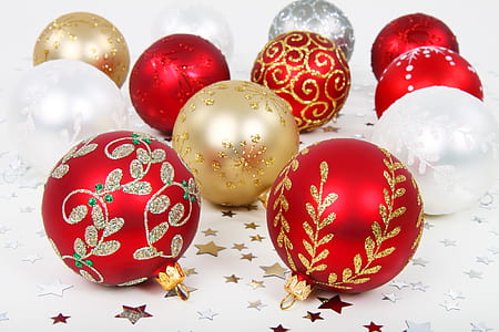 photo of Christmas balls on white textile thumbnail