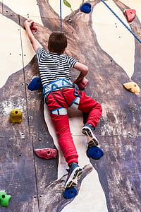 boy climbing on wall thumbnail