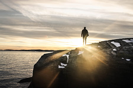 Man Standing on Cliff thumbnail