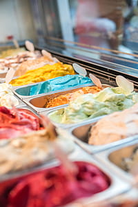 Assorted-flavor Ice Cream in Display Shelf Selective Focus Photography thumbnail