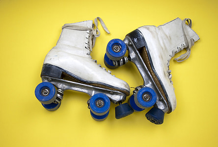 pair of white leather roller skates thumbnail