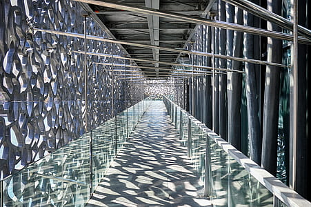 architectural photography of grey tunnel thumbnail